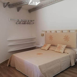 Camera da letto di un bungalow Dolceluna